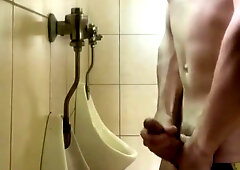 Public urinal jerkoff pop-shots at the beach