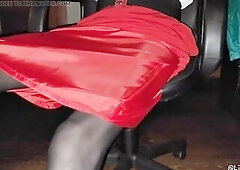 Wearing a red lined office petticoat with glossy hose under my desk.