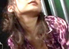 Nerdy looking Japanese cutie with glasses turns into a whore who sucks two cocks at once