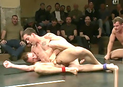 Ripped duo dominating wrestling match