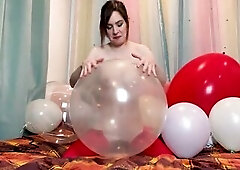 Popping, humping, and messing with balloons on top of a large, red balloon! I like how clearly u can watch throughout the bobo balloon, reminds me of 