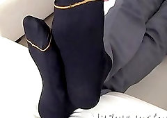 Hot brunette hunk shows off his sexy toes and feet