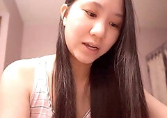 Adorable Asian girl delivers soothing ASMR vibes