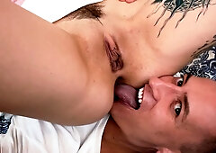 Slutty tattooed Canadian brunette Eden Ivy mounts the face of Charlie Dean, so he can perform ass licking and endure face sitting with her wet trimmed
