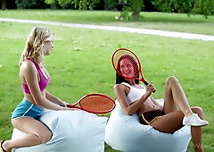 Kira Adams and a blonde lover share a steamy outdoor break after tennis