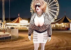 Juggsy is a large titties female masking sissy and that babe talks indecent. This kinky doll models an open breast mini suit with no brassiere or pant