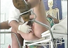 Aged woman with bushy vagina gets fingered and fisted by her doctor.