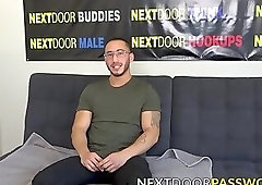 Muscular homo Xavier Cole stroking cock after an interview