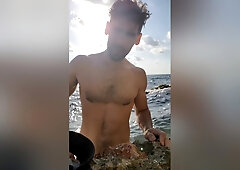 Klaus Joe Naked Next To A Restless Sea