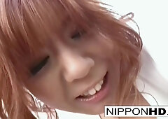 Cute Japanese girl wears a vibrator in her shorts