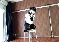 A Woman Is Being Punished While Wearing A Vibrator-equipped Chastity Belt