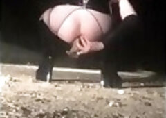 Crossdresser Slut public outdoor anal games with dildo and plug near the street