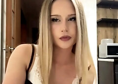 Blonde Beauty Poses and Teases in Modern Kitchen