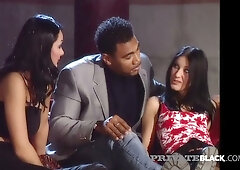 Mandy Bright joins a sensual threesome with a black-haired beauty and a muscular lover