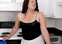 Chubby black tgirl tugging dick in kitchen