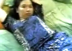 Homemade Video of a Mature Asian Couple