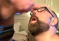 Bearded guy takes two loads to the face from his buddy