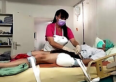 Kinky nurse's femdom diaper changing for dirty patient