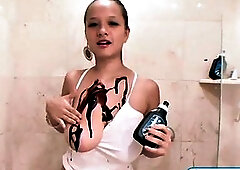 Teen Paris Milan showers her body in chocolate