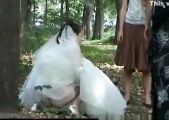 Outdoor hidden pee bride and friends