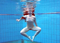 Pretty Polish teen Alice swimming without clothes on