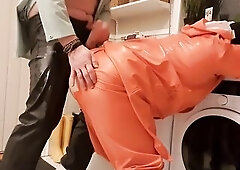 Tugjob and squirt on wife's greased up rainwear and rubber boots