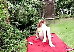 56 year-old Breasty Older Housewife Mrs. Barby gets lustful sunbathing in the backyard. That Babe lotions-up her LARGE OLDER MELONS, then rubs & f