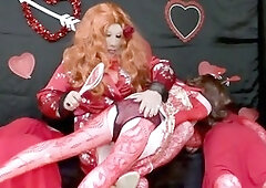 Sissy Valentine's Day cosplay with three blow-up dolls in action