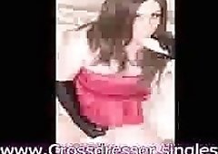 Crossdresser in red cocktail dress cum shot