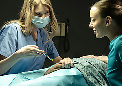 A couple of sexy chicks have a threesome with a patient