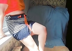 Sissy crossdresser Ketty flaunts sparkly high-heeled slippers with a cheeky grin