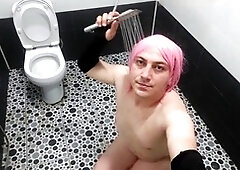 Curvy crossdresser Ketty teases on the bathroom floor