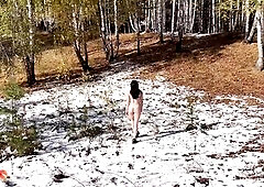 Сrazy beauty takes off her raiment in cold and warms up with sex in the autumn forest