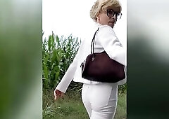 Tranny Wetting in hot white jeans !! Pissed in full public!