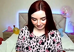 Ginger amateur babe NicolPot with big boobs strips down to bra on webcam