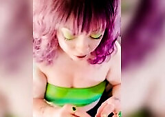 Miss Tna Snua clothed in a spandex top and a purple wig smokes a Richmond Superking Original cigarette with a lot of closeups, dangles, drifts and no 