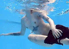 Mimi Cica gets lustful underwater & naked