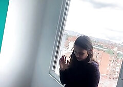 2 co-workers were arguing about problems in the company and they happen to bang in front of a window where many people watch 'em