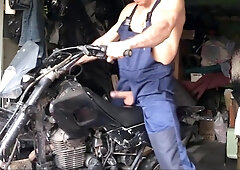 A Russian MECHANIC repairs a MOTORBIKE in the garage and gets thrilled and PORKS a silicone backside