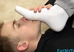 Foot sniffing teenager blows big dick