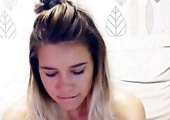 Sexy brunette babe in lingerie and stockings toys pussy