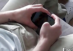 Tattooed twink Axel masturbates solo while watching porn