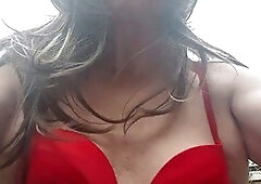 Mature Betty Spanxxx enjoys a solo session in her crimson swimsuit