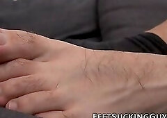 Young man jerking off with his hands and feet