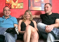 Beautiful high-heeled chick likes intensive sex with two big cocks