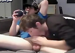 Friends on webcam have fun on the couch sucking cock