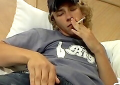 Blonde twink Casey meatpipe masturbates off his impaler while smoking