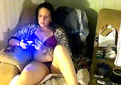 Hawt Mamma Smokin' Cigarettes Playing movie Games In Purple Brassiere and Pants