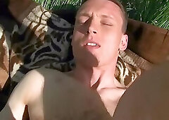 Cutesy young fellow tempted next to a field of flowers