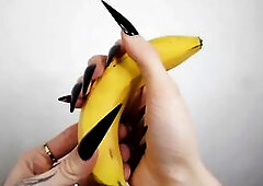 Lengthy Ebony Stiletto Nails Jerking off Banana